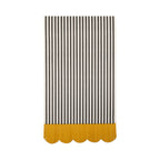 Close up of the black and cream striped dinner napkins with fringe and scalloped edges