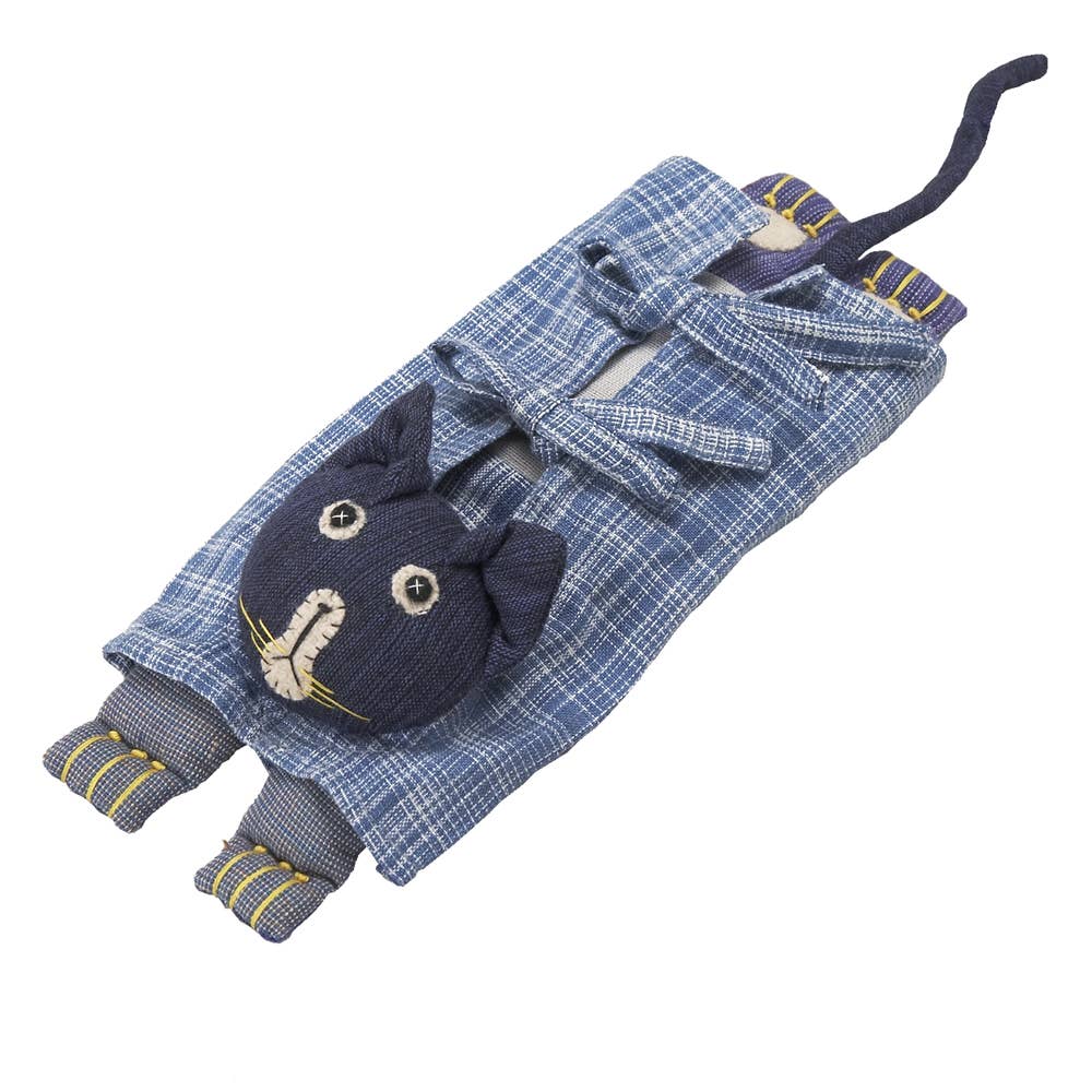 Close-up of the flax-filled pillow with removable clothing and stitched details