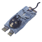 Close-up of the flax-filled pillow with removable clothing and stitched details