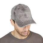 Man wearing a gray denim cap with "Chronic But Iconic" embossed on a white background