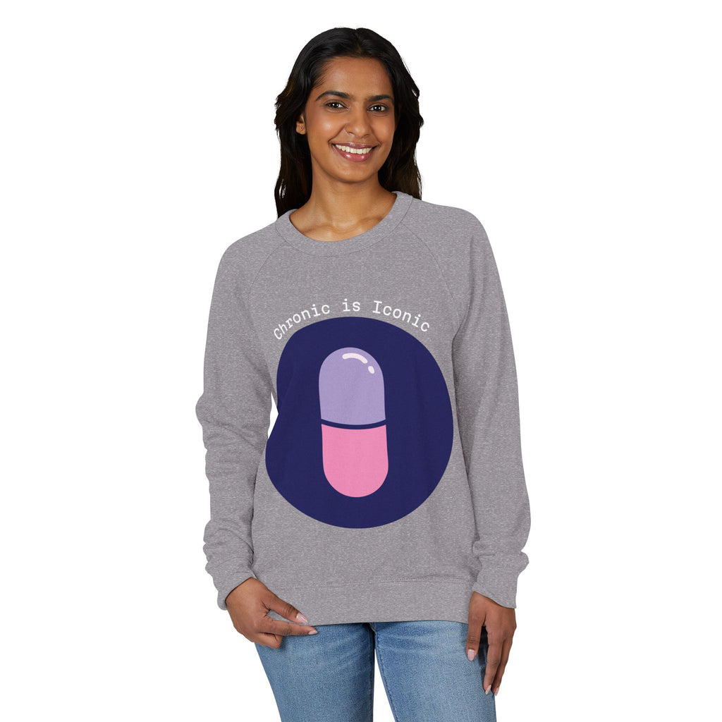 Woman wearing a gray sweatshirt with a colorful pill graphic and text on a white background
