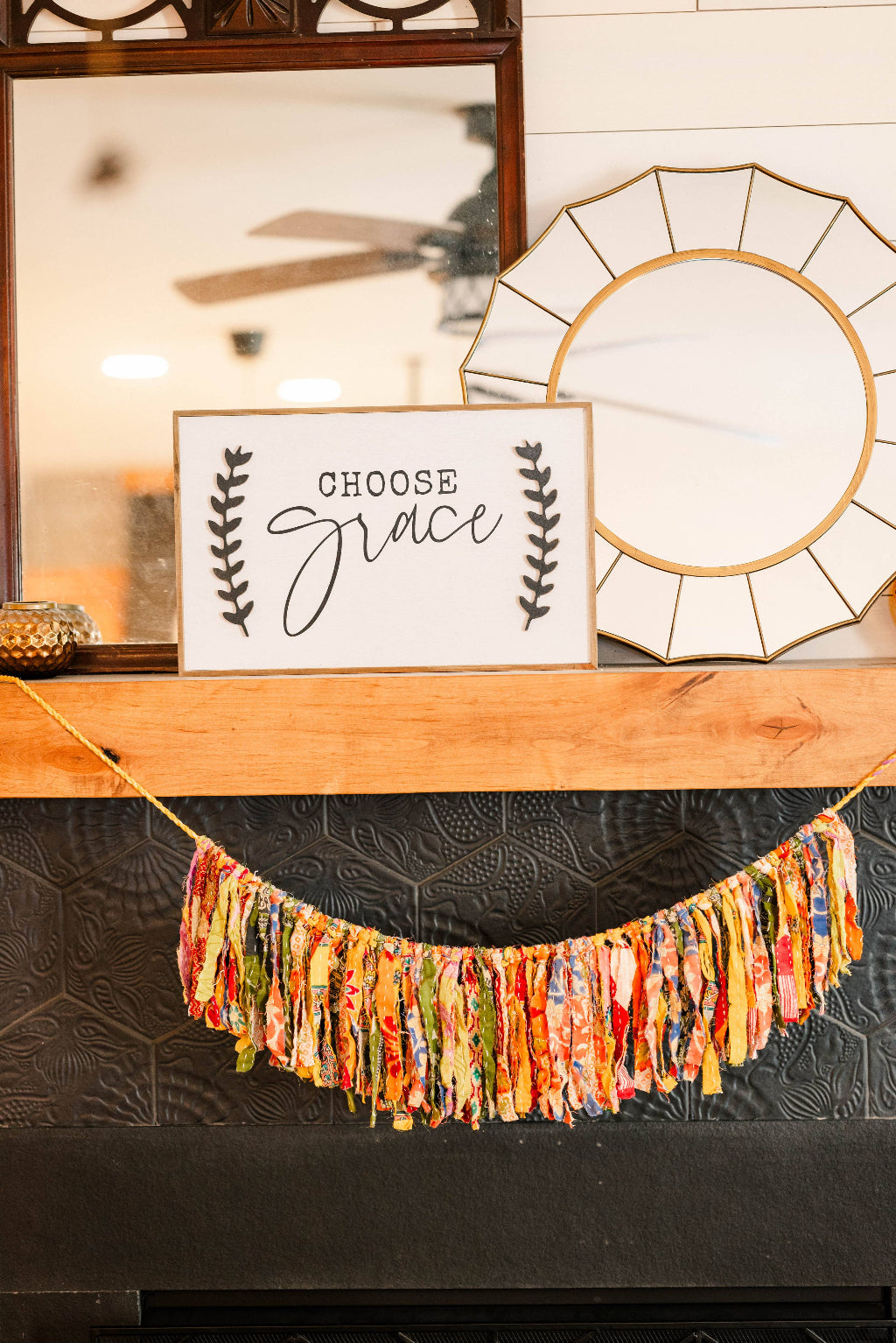 Decorative banner with 'Choose Grace' sign on a mantelpiece.