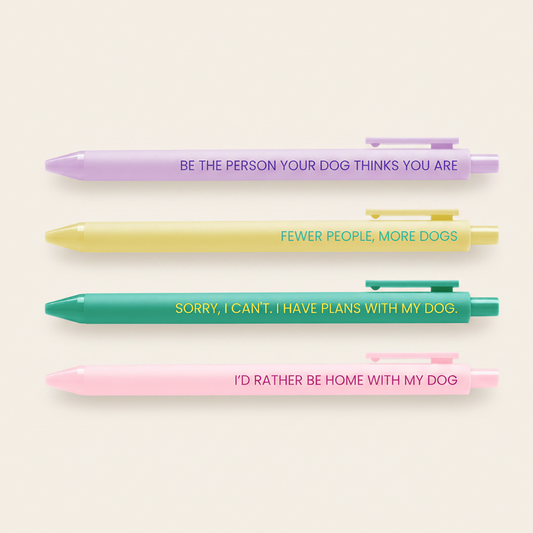 Five pens with humorous quotes about dogs on a white background