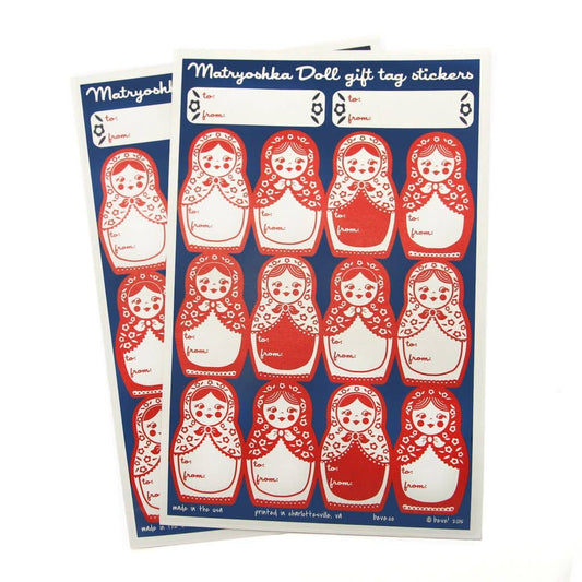 Matryoshka Doll gift tag stickers with red and white design on a blue background