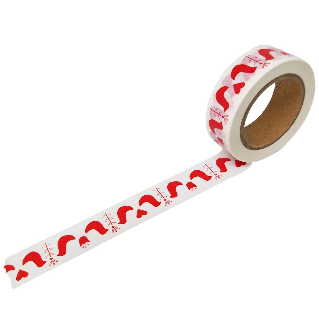 Roll of decorative tape with red pattern of birds and folk art flowers on a white background