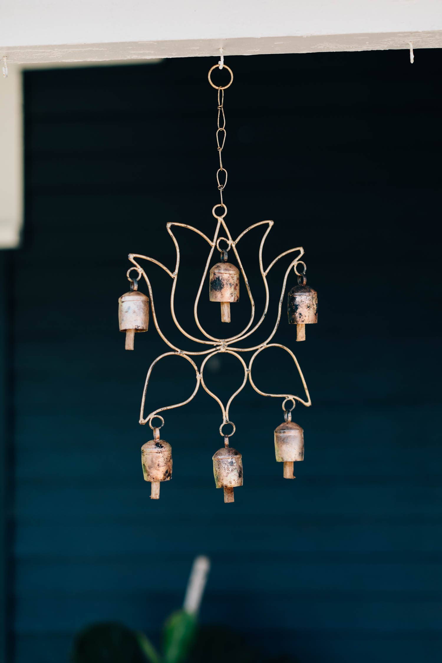 Decorative wall display featuring the peaceful chime in an indoor sanctuary space