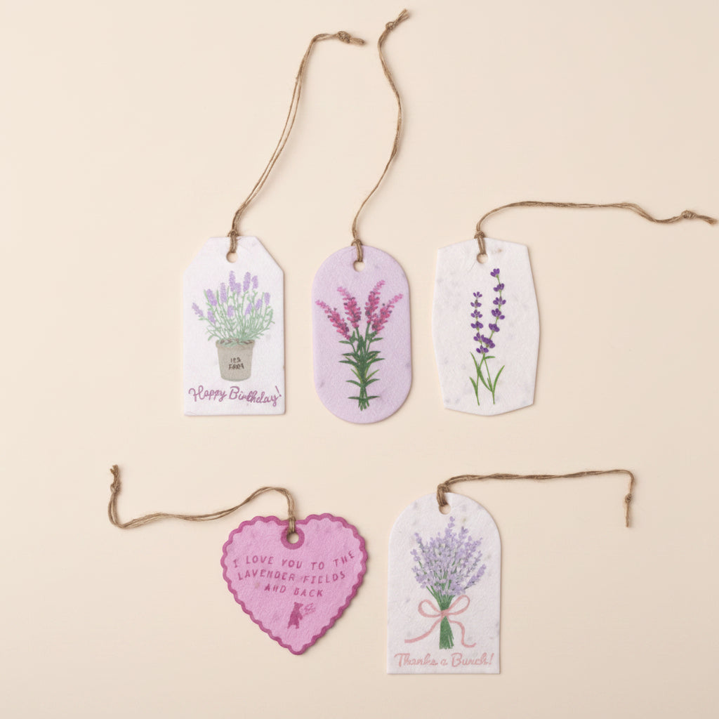 Set of decorative gift tags with lavender designs on a white background