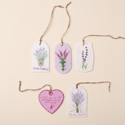 Set of decorative gift tags with lavender designs on a white background