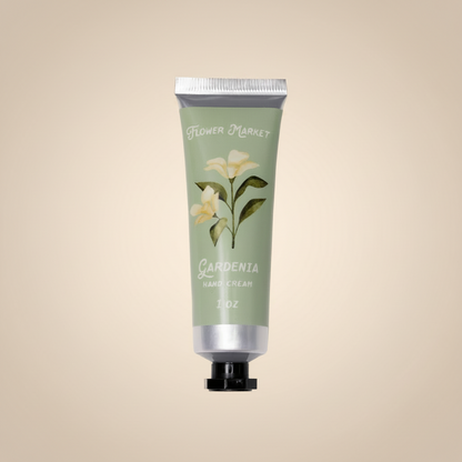 Hand cream tube with floral design on a white background