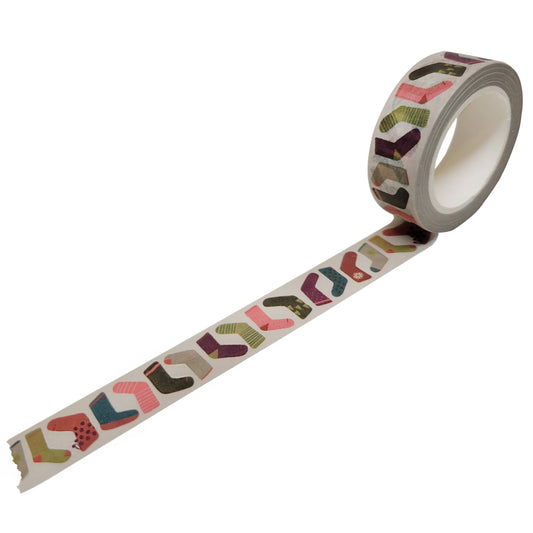 Roll of decorative tape with colorful stocking pattern on a white background