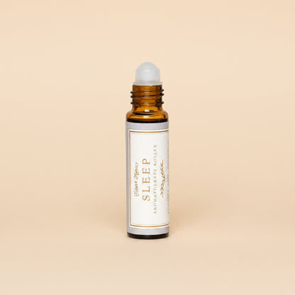 Roll-on bottle labeled 'Sleep' on a white background