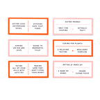 Flat lay of the Debatable Game Set with cards fanned out on a table