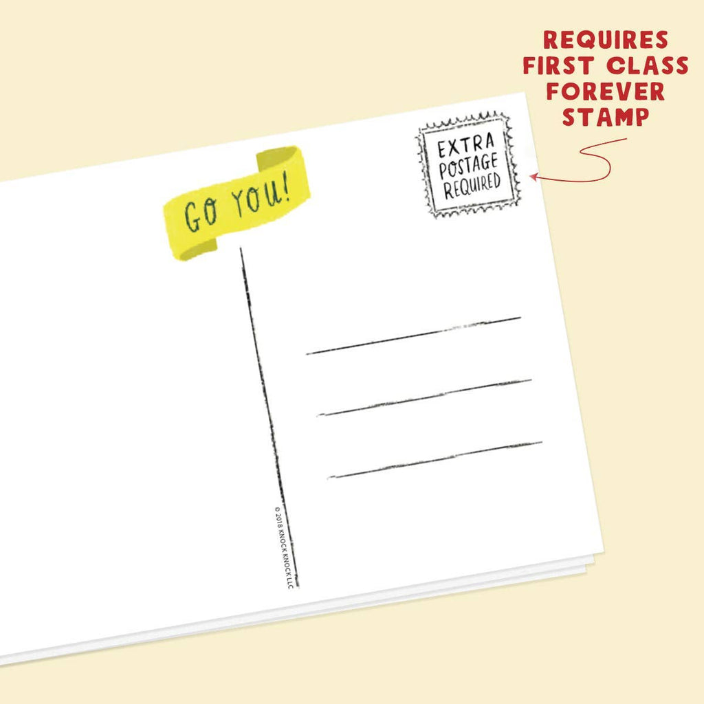 Blank postcard with a yellow 'GO YOU!' sticker and text about postage requirements on a beige background.