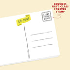 Blank postcard with a yellow 'GO YOU!' sticker and text about postage requirements on a beige background.