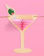 Martini banner with gold foil martini glasses, green olives, and pink tissue accents | 3D paper garland for parties