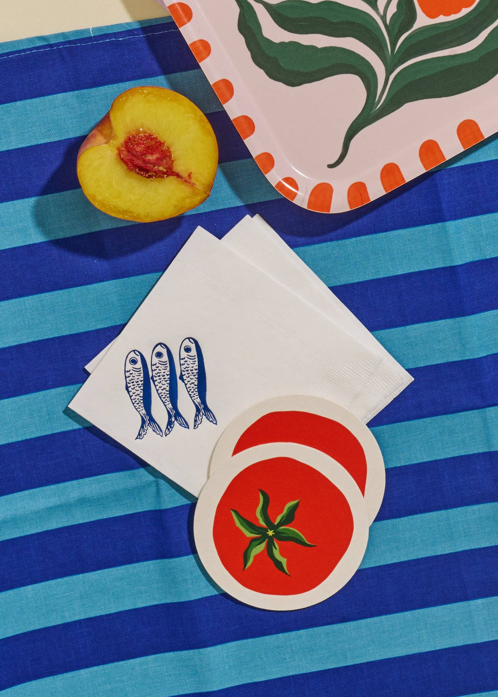 Tomato coasters used on a summer event table.