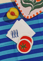 Tomato coasters used on a summer event table.