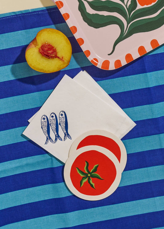Tomato coasters used on a summer event table with sardine napkins and table decor