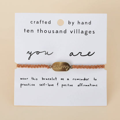 Bracelet with 'you are' message on a card from Ten Thousand Villages