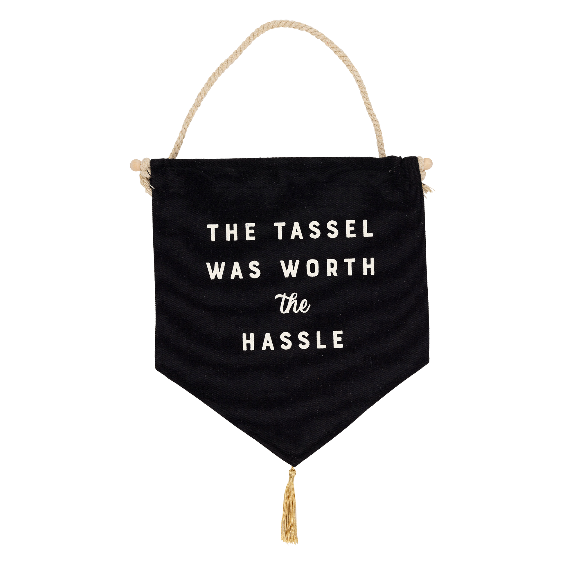 Close up of the Graduation canvas banner with "The Tassle Was Worth the Hassle" text, wood dowel, and gold tassel