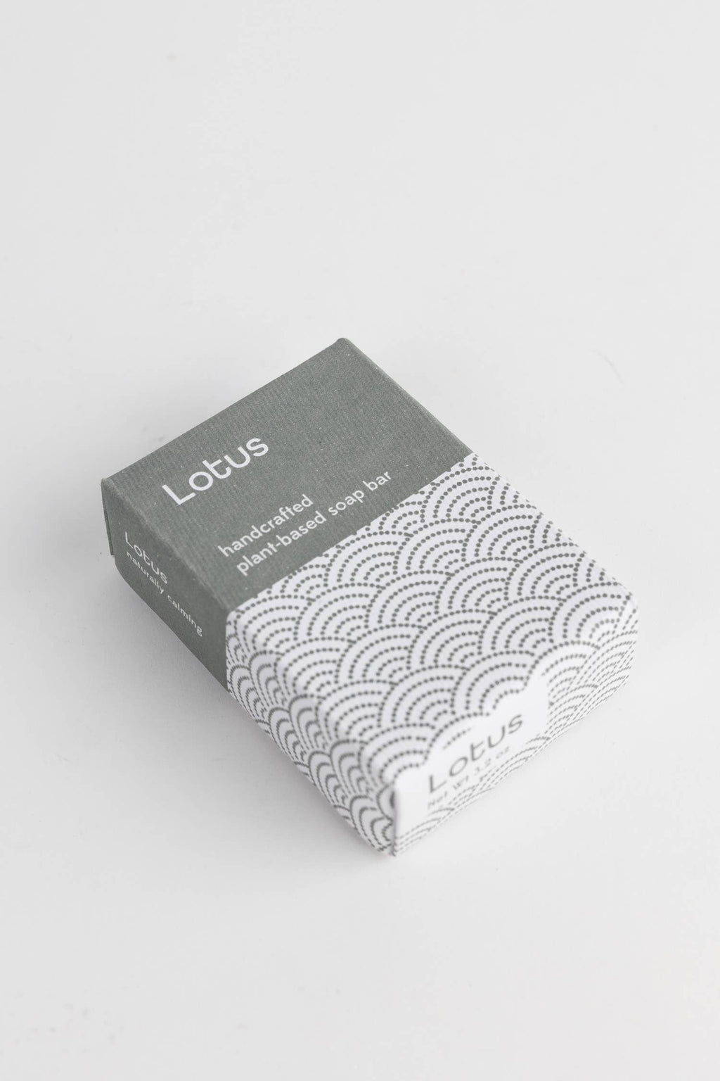 Pack of Lotus plant-based shoes on a light gray background