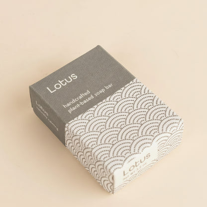 Pack of Lotus plant-based shoes on a light gray background