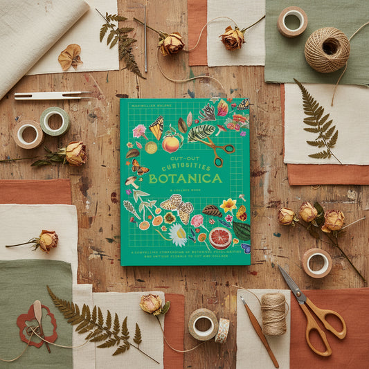 Collage book cover titled 'Botanica' with illustrations of plants, flowers, and scissors on a green background.