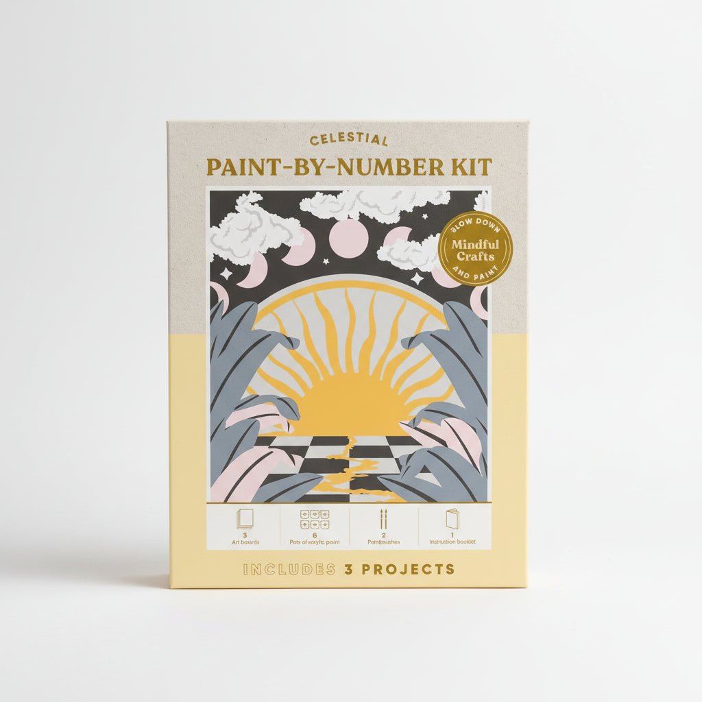 Celestial paint-by-number kit packaging with sun and moon design on a beige background