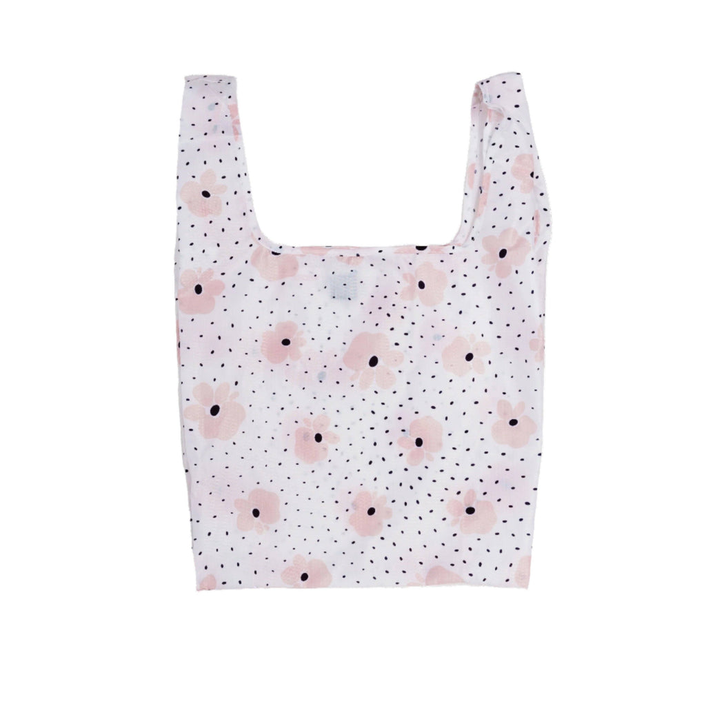 Carley Daily Shopper from BRNG bag with pink flowers and black polka dots unfolded and on a white background.