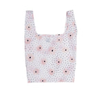 Carley Daily Shopper from BRNG bag with pink flowers and black polka dots unfolded and on a white background.