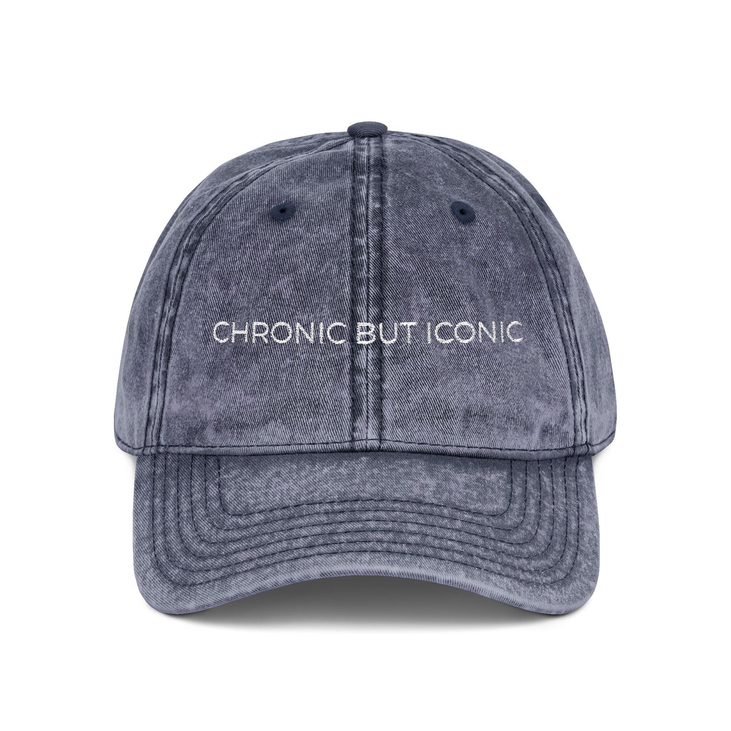Blue cap with 'Chronic But Iconic' text on a white background