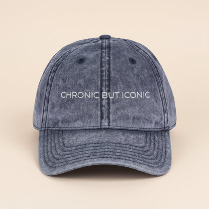 Blue cap with 'Chronic But Iconic' text on a white background