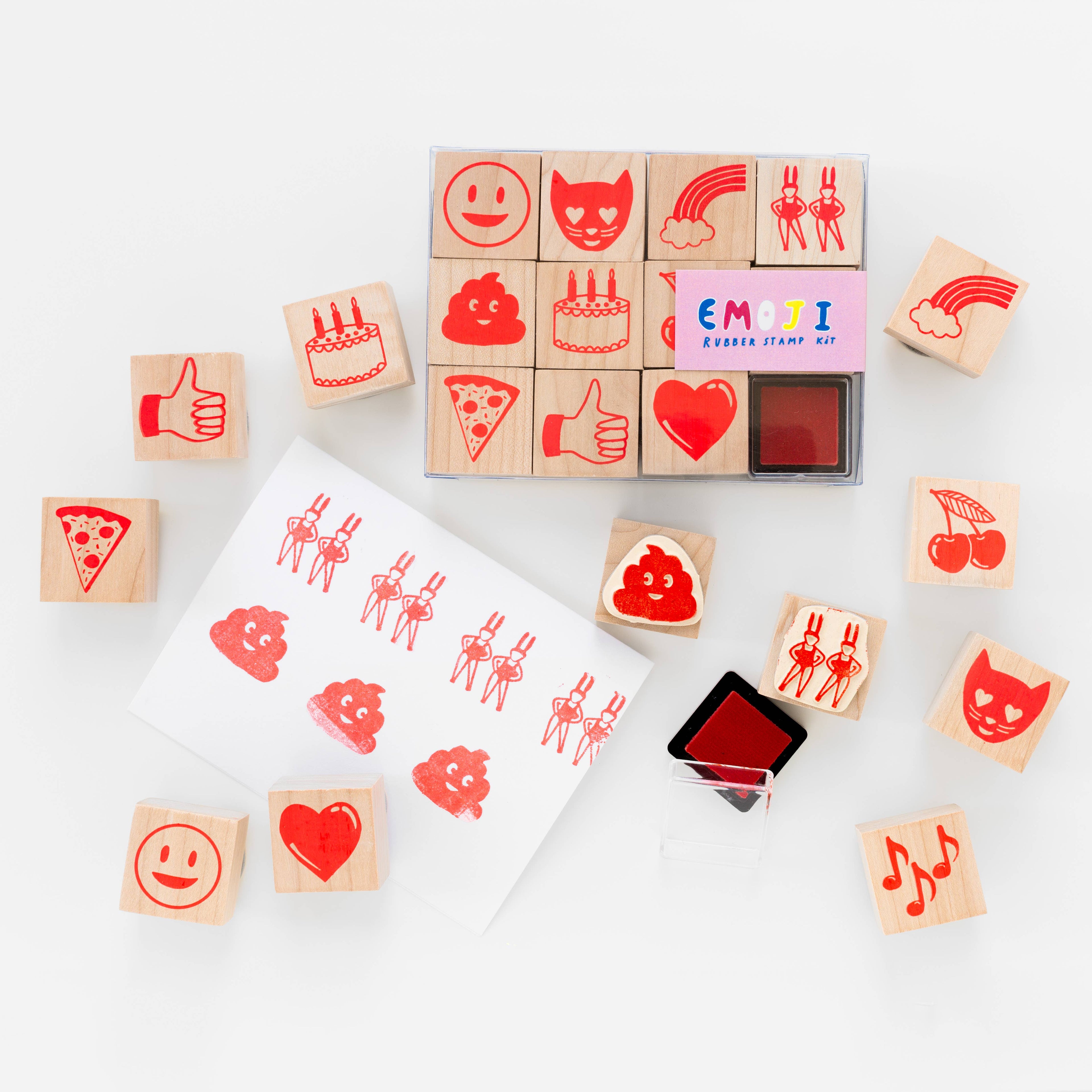 Complete Emoji Stamp Kit featuring bubble letter stamps and an electric blue neon ink pad. Includes 11 stamps and 1 ink pad, packaged in a clear box.