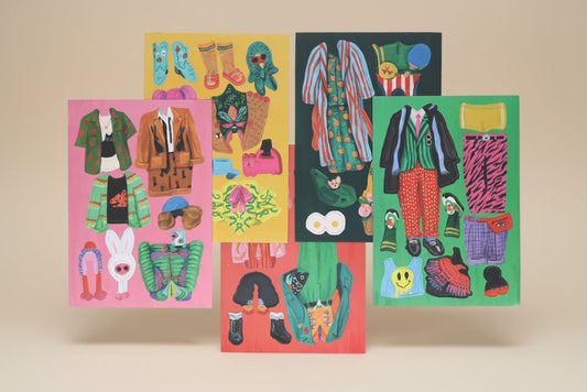 Set of colorful clothing and accessory magnetic cards on a white background
