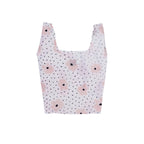 Compact tote bag with a blush pink floral pattern on a black speckled background.