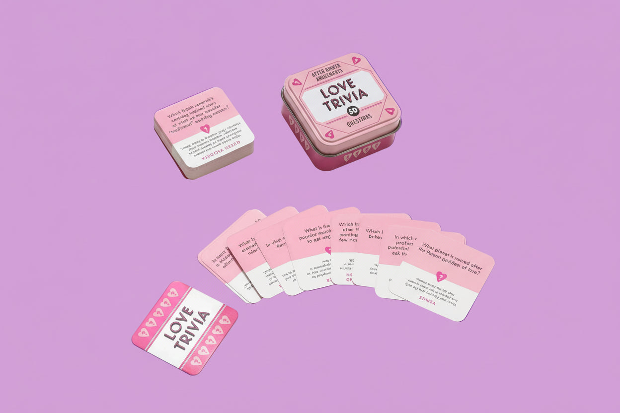 Love Trivia game cards in a pink tin on a pink background
