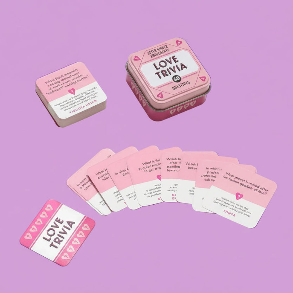 Love Trivia game cards in a pink tin on a pink background