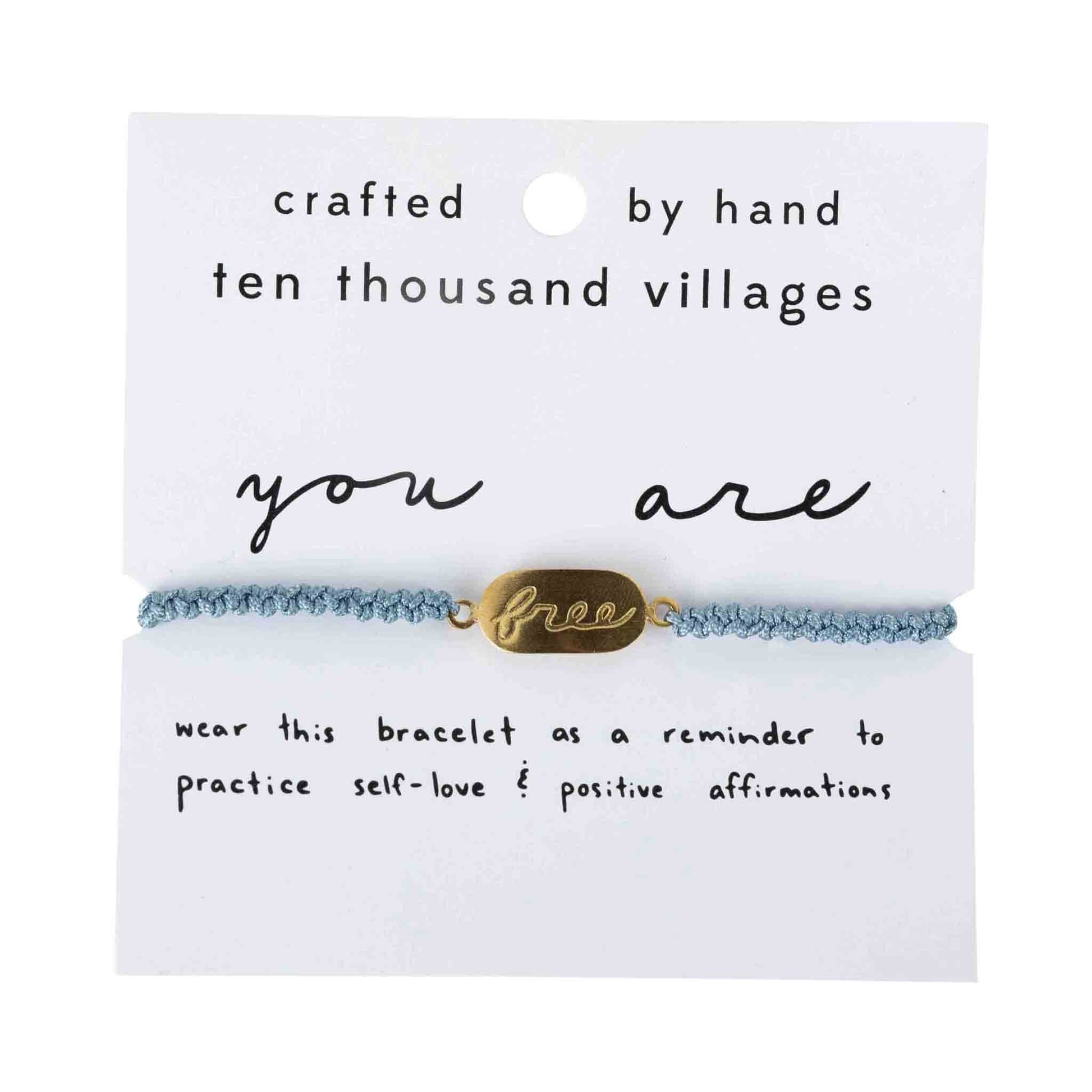 Bracelet with 'you are free' tag on a card from Ten Thousand Villages