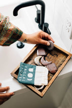 Garora stone set styled on a vanity with skincare essentials