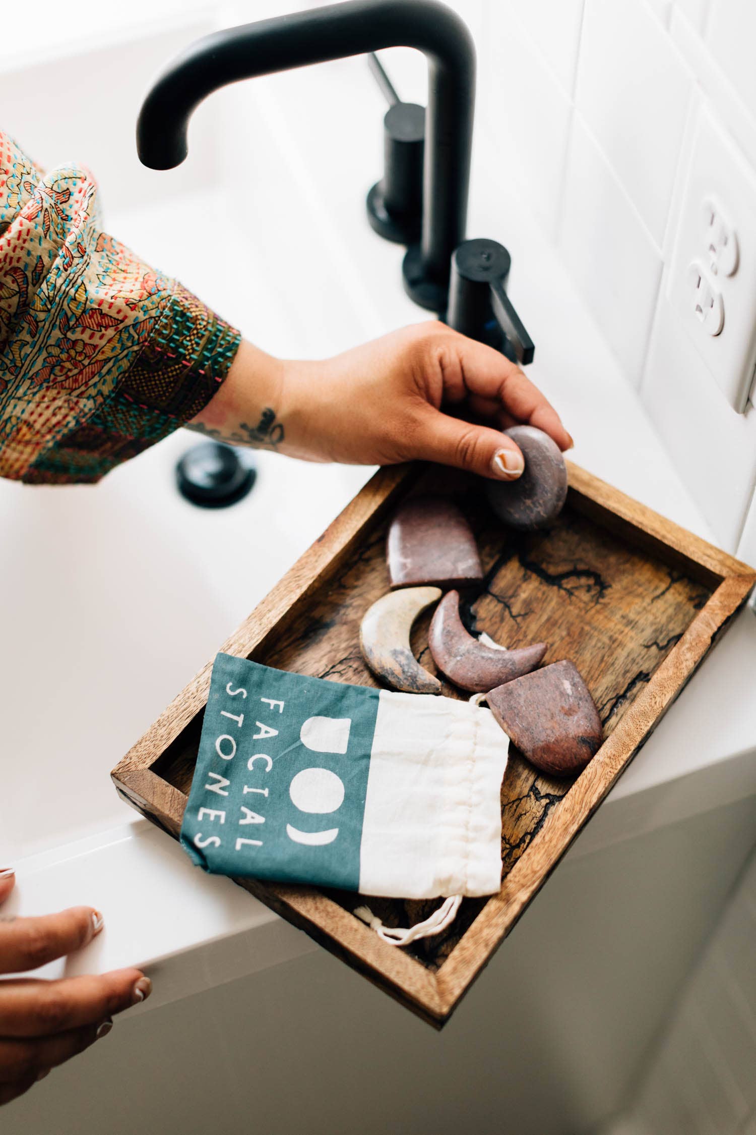 Garora stone set styled on a vanity with skincare essentials