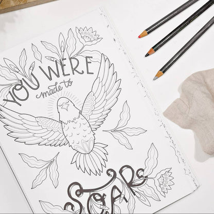 "You are made to Soar" prompt on the coloring book page with a bird.
