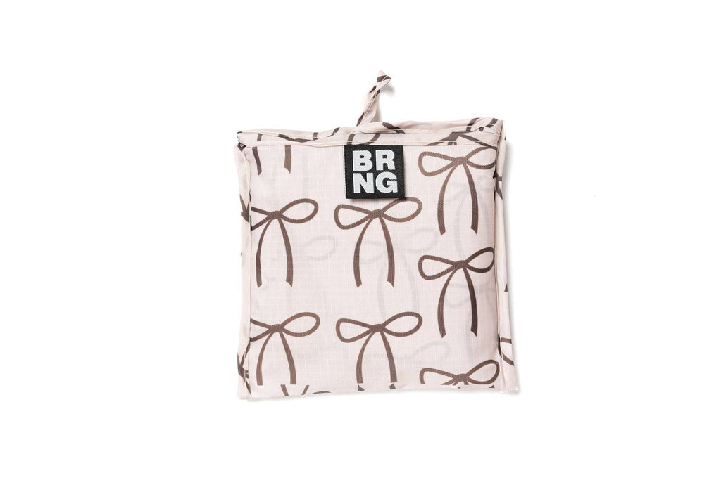 Elise BRNG Bag folded up in a compact size on a white background.