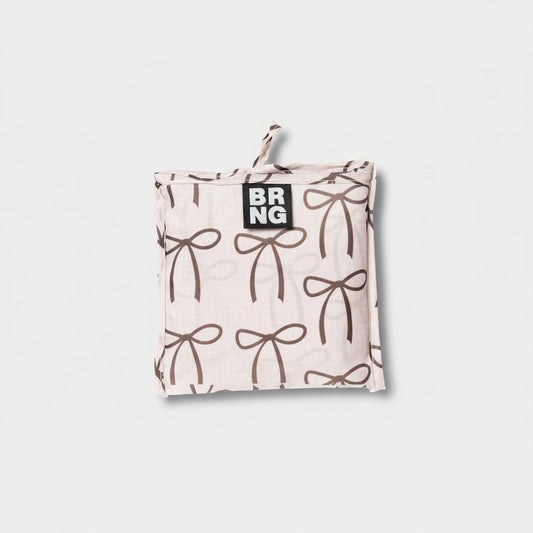 Elise BRNG Bag folded up in a compact size on a white background.