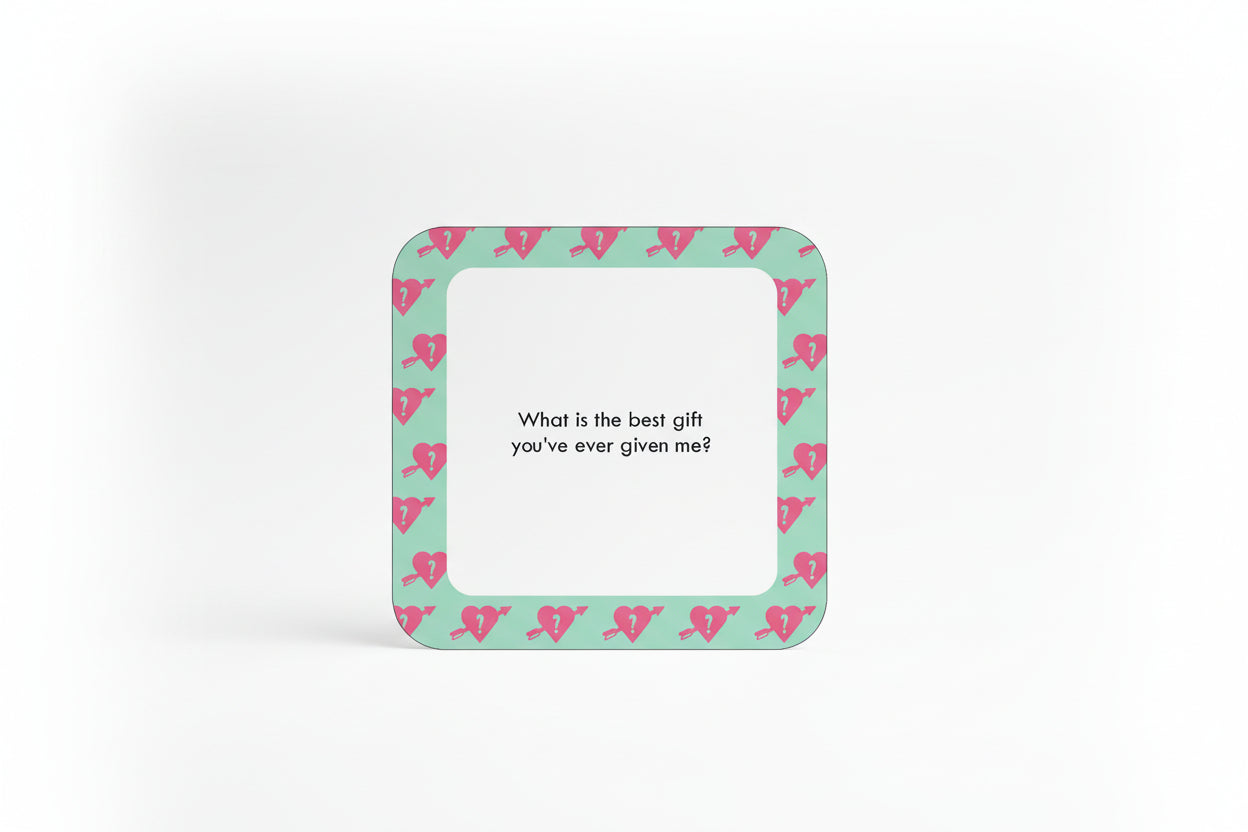 Card with text 'What is the best gift you've ever given me?' on a green background with heart and question mark designs.
