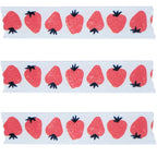 Three strips of washi paper tape with red strawberry pattern on a white background