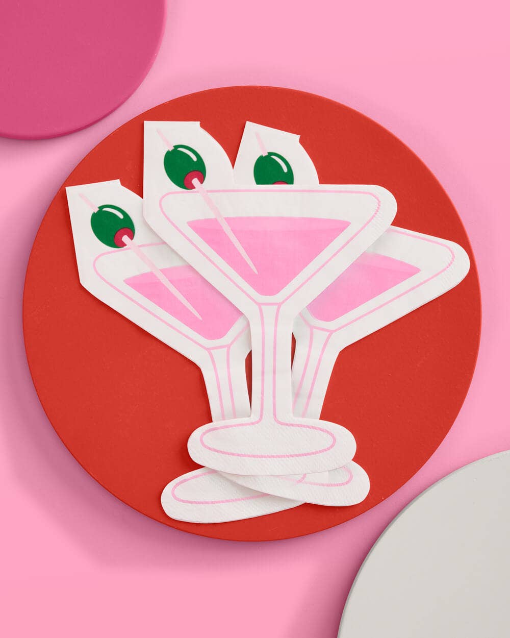 "Extra Dirty" martini-themed paper napkins with a printed pink martini glass and green olive, perfect for cocktails, birthdays, and celebrations.