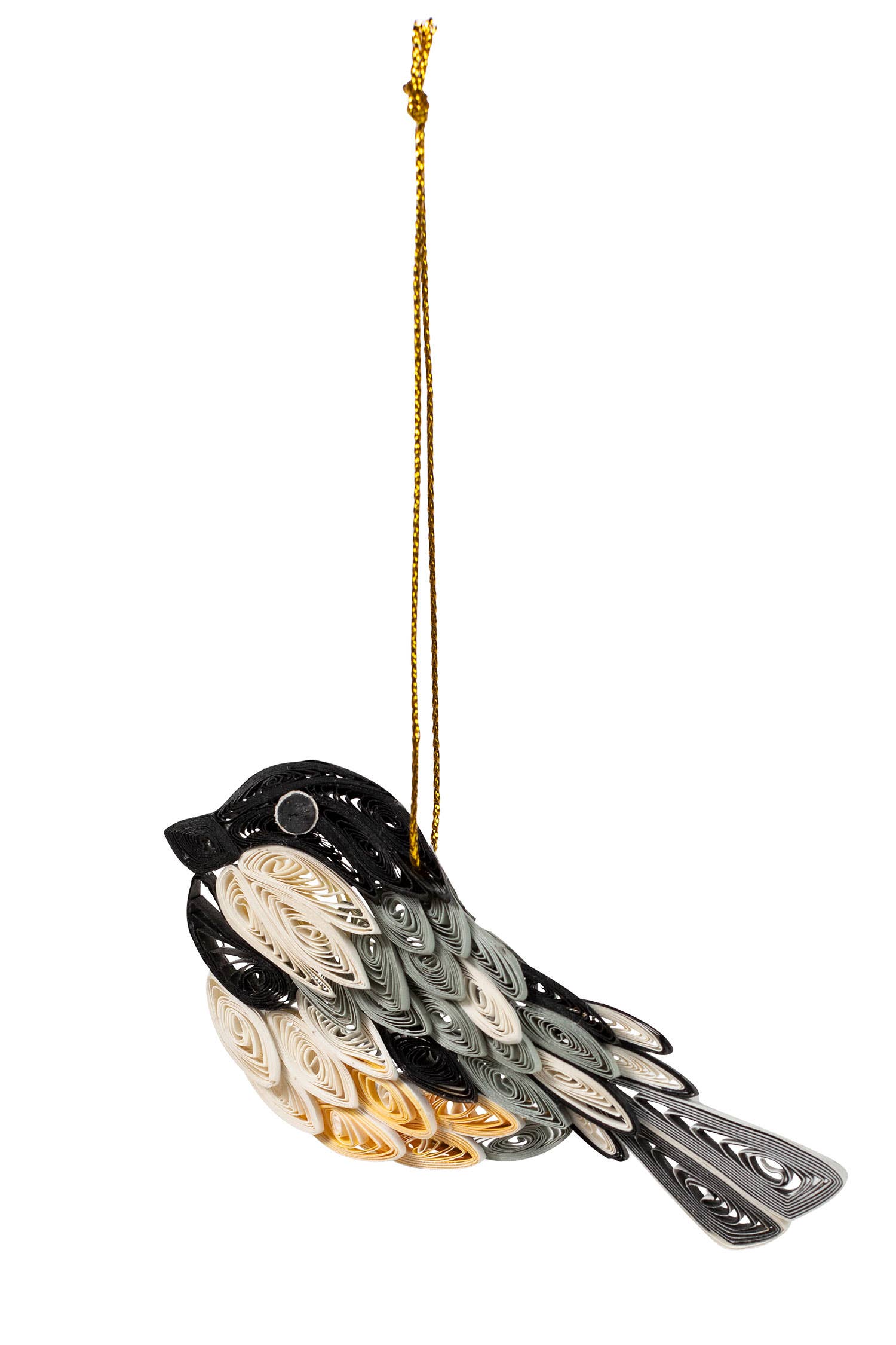 Decorative bird ornament made from paper, hanging on a gold string against a white background.