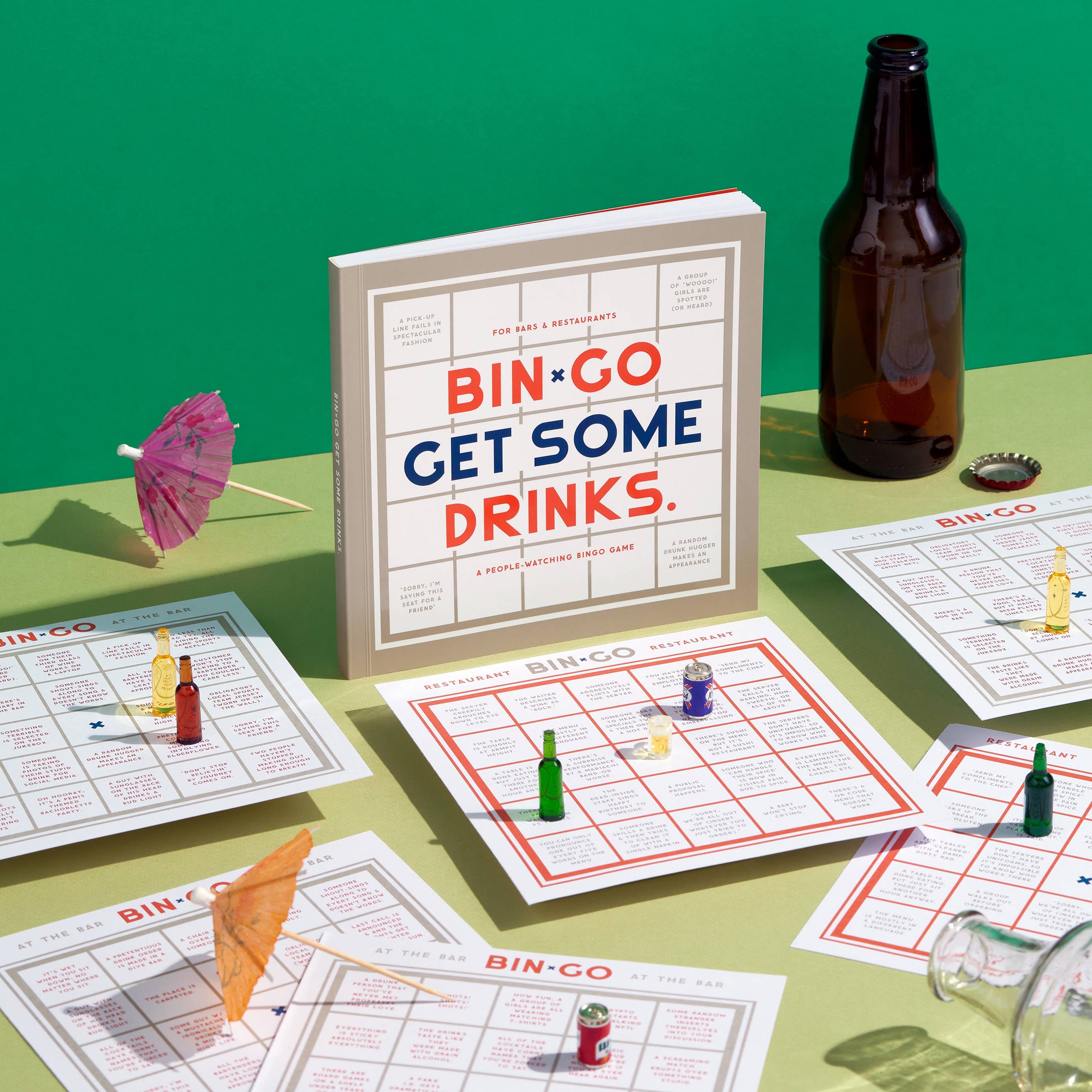 Image of the tabletop while a group of friends are playing Brass Monkey Bin*Go game at a bar