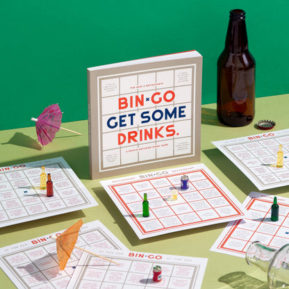 Image of the tabletop while a group of friends are playing Brass Monkey Bin*Go game at a bar