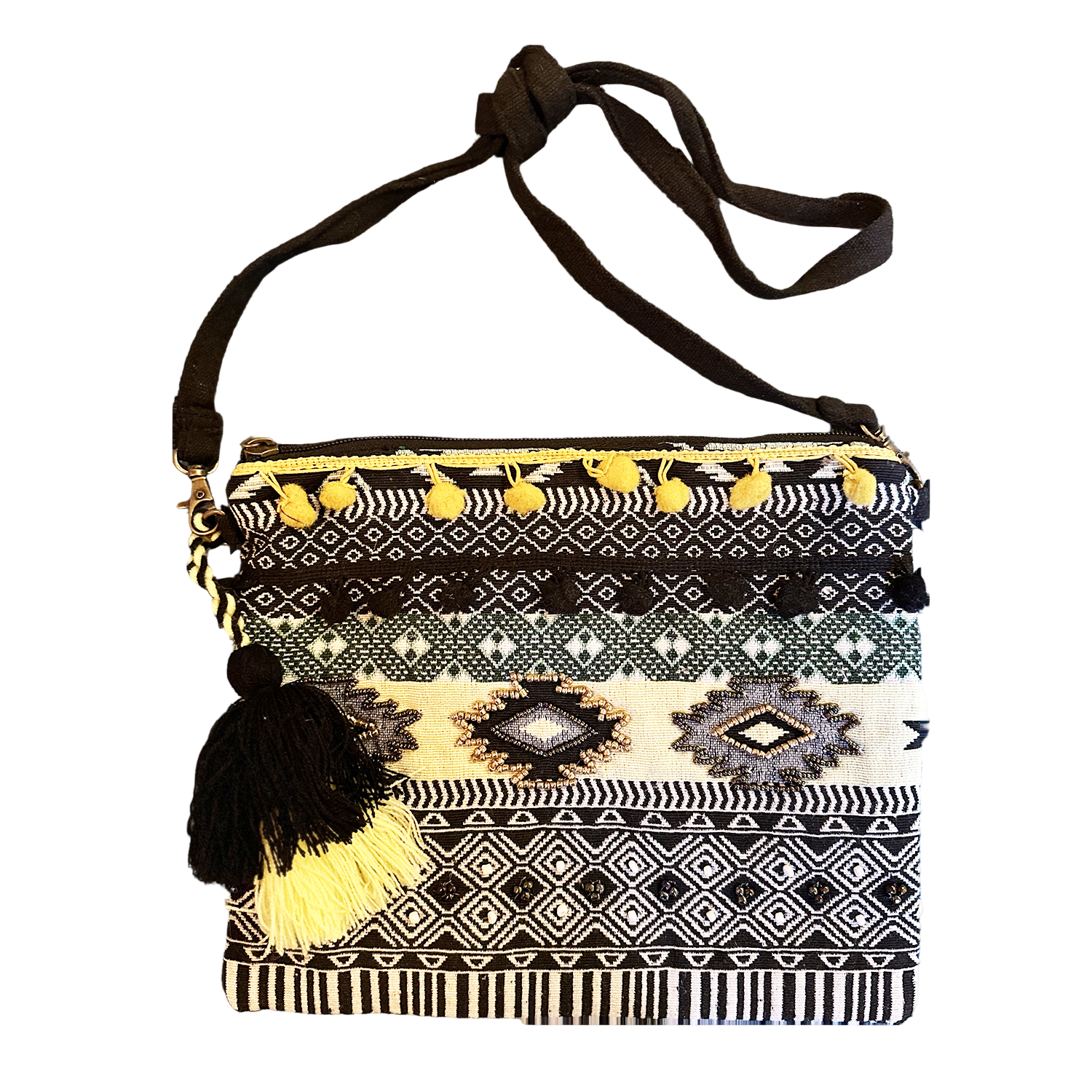 Patterned handbag with tassels on a white background